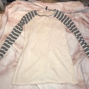 Cream sweater with striped sleeves